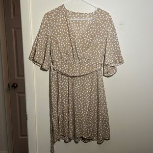 Tan dress with belt.